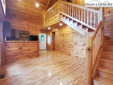 Great room open to the kitchen and loft bedroom