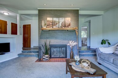 Moody Fireplace to contribute to the cozy vibes of this room!