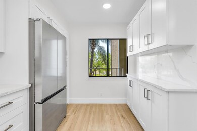 7290 Kinghurst Dr unit 301, Delray Beach, FL 33446 - photo 3