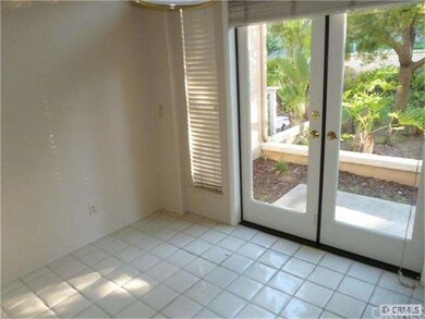 Eating area off kitchen with view of patio