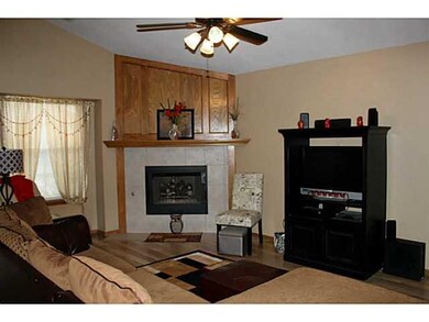 Living Room. Living room features a corner firepla