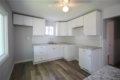 Fully remodeled kitchen with new floor, countertop