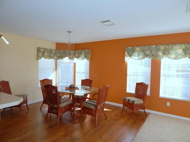 Dining set is included. Custom window treatments.