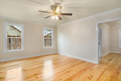 Spare room featuring light wood-type flooring, cei