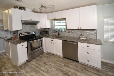 302 Plantation Dr, Titusville, FL 32780 - photo 7