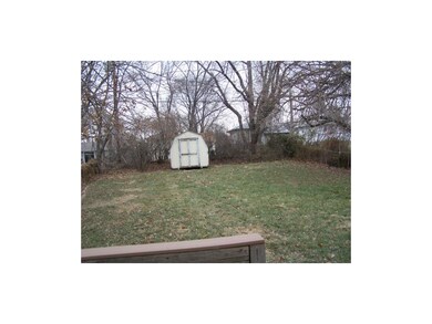 Fenced Back Yard with Outbuilding