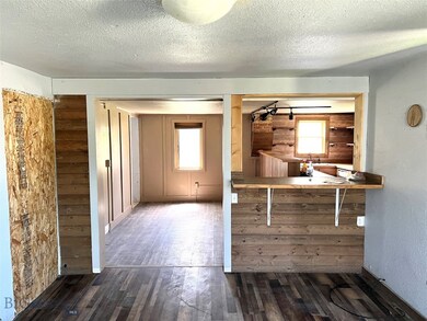 View from L/R to kitchen and dining