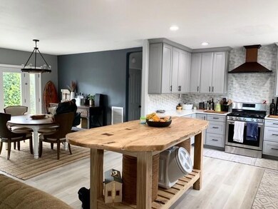 Opens to spacious dining room