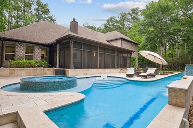 Private heated + chilled pool with hot tub + outdoor shower. Fenced back yard. Over 725 sqft of screened in back patio.