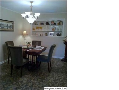 Cute built-in shelves in dining room.