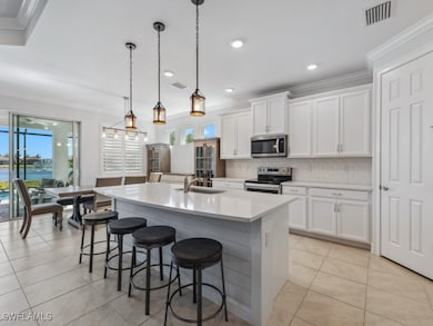 Kitchen with appliances with stainless steel finis