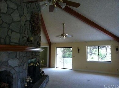 View of large dining area off living room with nic