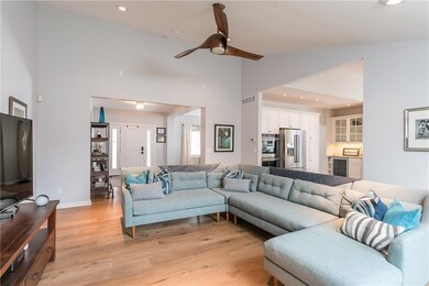 Family Room . . . View of Kitchen & Foyer
