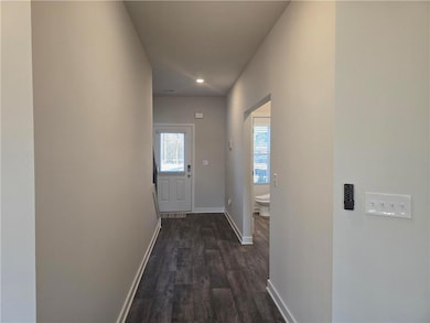 Entryway featuring recessed lighting