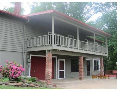 Exterior Back/Side. Enjoy a cool crisp morning or warm summer breeze from on of your two decks.