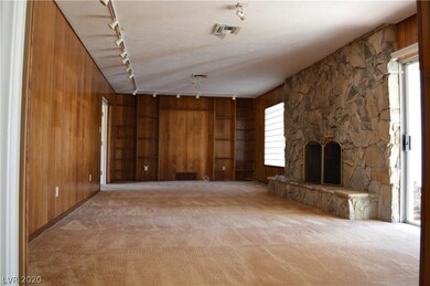 Family room with fantastic stone fireplace.