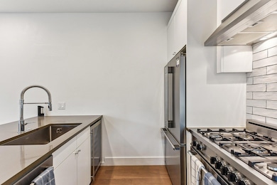 Kitchen featuring appliances with stainless steel