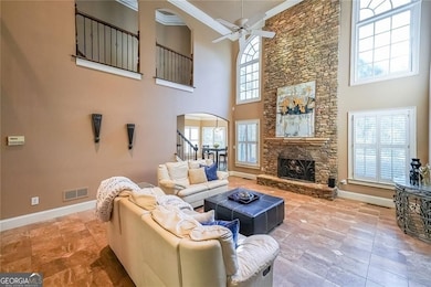 Second view of great room with overlooking balconies.