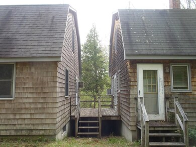 Small deck connecting two houses.