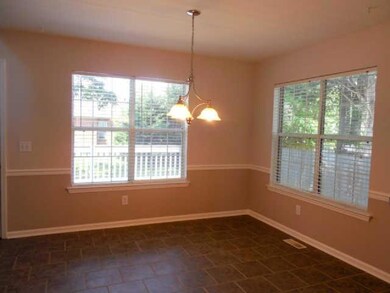 Breakfast Area with Tile Flooring and Lots of Natural Light