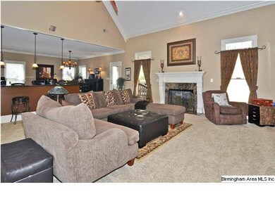 Living room is very open to the huge kitchen and d