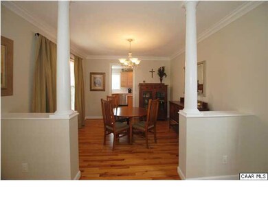 The living room opens into the dining room.