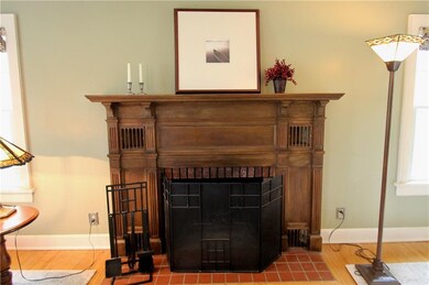 The detailing on this woodburning fireplace is an 