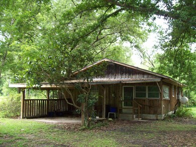 Side Porch Entry With 1-Car Carport