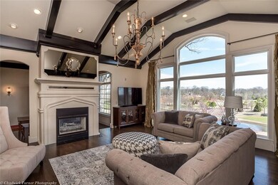 Inviting Living Room w/expansive Golf Course & Wat
