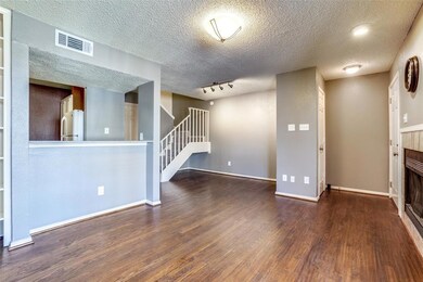 Living room opens to dining and Kitchen areas.