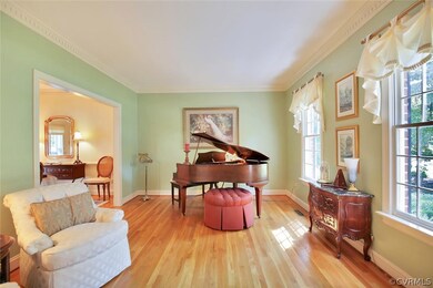 The foyer opens to the sun filled living room with