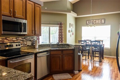 Eat-in kitchen features custom 42