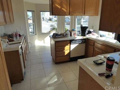 Kitchen area shows owner is still cleaning but wil