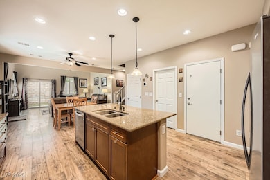 This inviting kitchen features rich maple cabinetr
