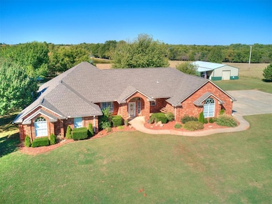 View of front of property featuring an outbuilding