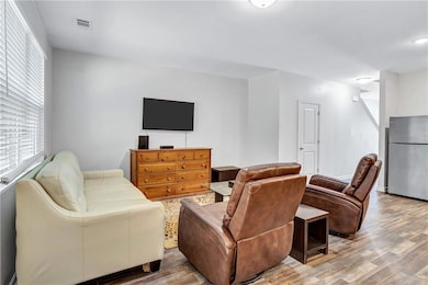 Living room featuring wood finished floors