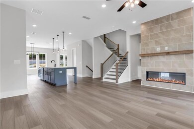 Unfurnished living room featuring light wood finis