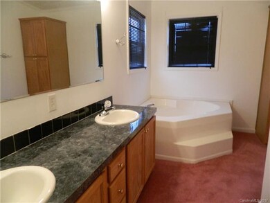 Master bath has shower and garden tub
