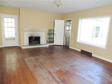 Living Room. The formal living room has original h