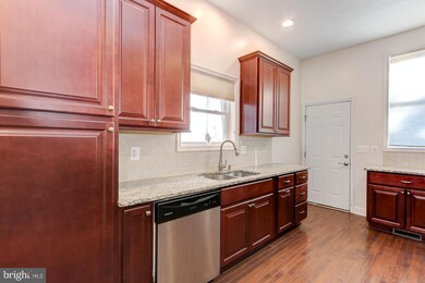 1519 N Caroline St, Baltimore, MD 21213 - photo 4