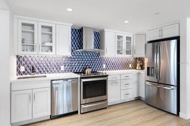 Photo is from a renovated Deluxe floor plan; not a