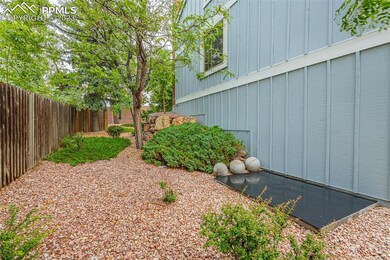 Side of townhome w/ custom concrete pad