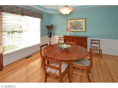 Dining Room - Formal Dining Room Boasting Wood Flo