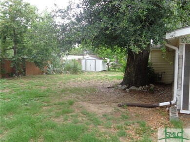 Backyard with storage shed
