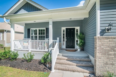 Property entrance with a porch