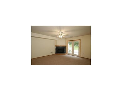 Living Room. Showing gas fireplace and french door