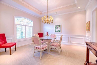 The natural light and tray ceiling gives this room