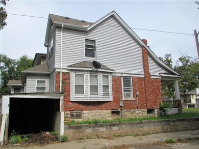 Garage and fenced in yard in back.