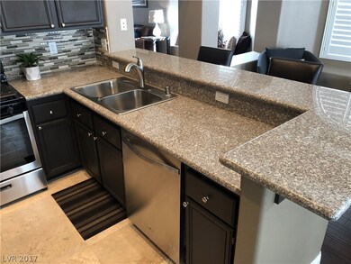 KITCHEN WITH STAINLESS STEAL APPLIANCES AND GRANIT