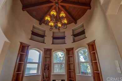 The ceiling design and custom woodwork brings thou